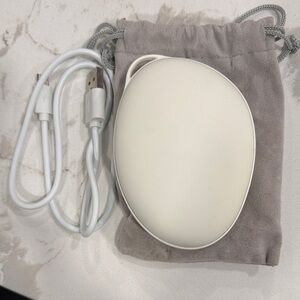 White Oval Hand Warmer and Power Bank Device with USB Cable